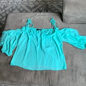 Cold shoulder ruffle top